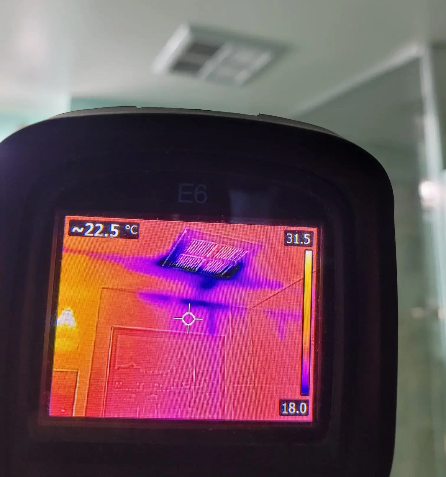 FLIR thermal camera image showing heat signatures in a Toronto home